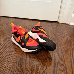 Nike Kids' Team Hustle D11 Black, Red, and Orange Sneakers